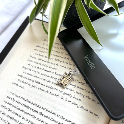 E-reader dust plug Book
